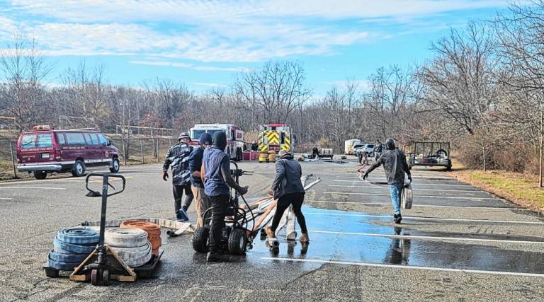 Members of Greenwood Forest Fire Company #3 do a mandatory annual equipment evaluation and inspiration Nov. 19. (Photo by Rich Adamonis)