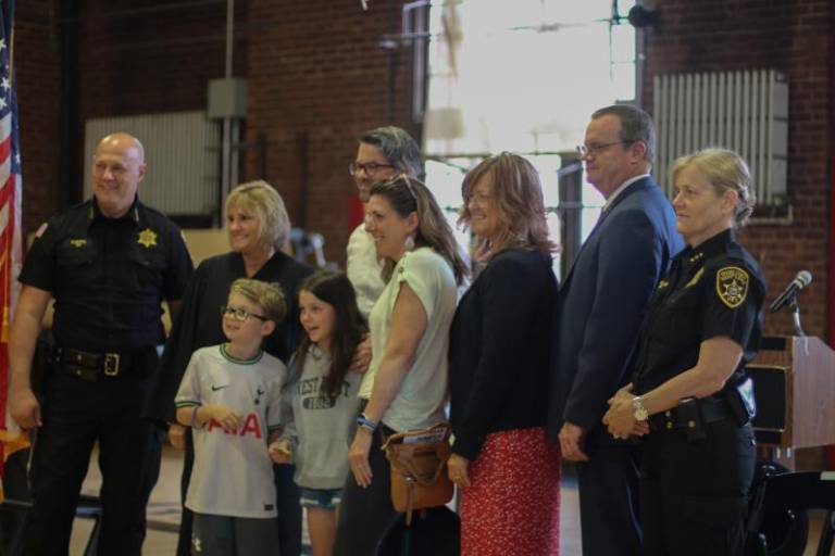 $!<b>Gordon Elliott and his family pose for a picture after the ceremony in Newburgh. Photo: Brianna Kimmel</b>