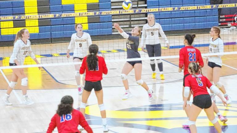 FV1 Jefferson's Kylie Plunkett (21) bumps the ball in the game against Secaucus on Nov. 14. The Falcons won in straight sets, 25-14, 25-23, in the Group 1 semifinal and went on to win the Group 1 title. (Photos by George Leroy Hunter)