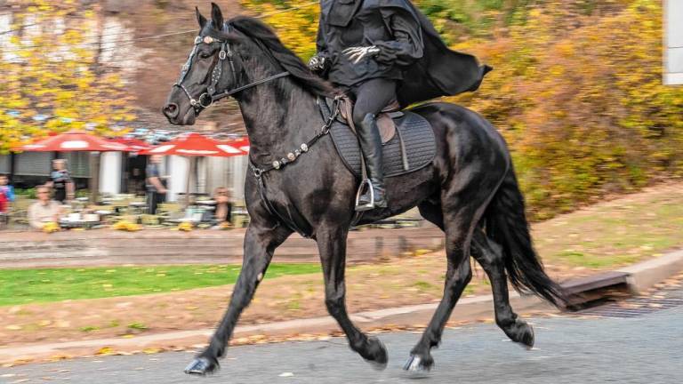 <b>The Headless Horseman rides through Sparta on Halloween. (Photo by Nancy Madacsi)</b>