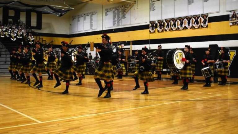 The West Milford Pipes &amp; Drums perform in 2023 during the 23rd annual Military Concert &amp; Tattoo in the high school gym. (File photo by Fred Ashplant)